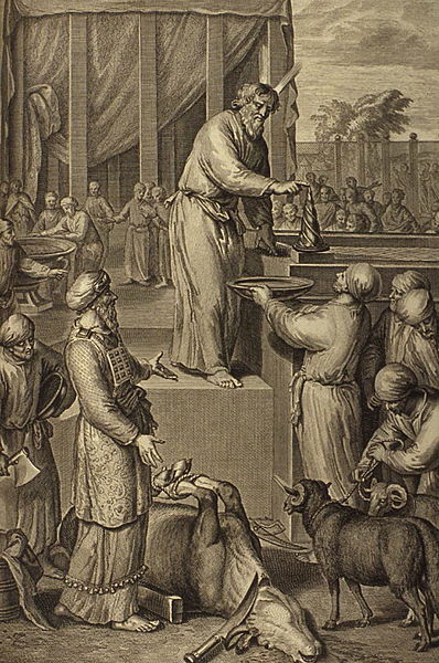 Moses consecrates Aaron and his sons and offers their sin offering